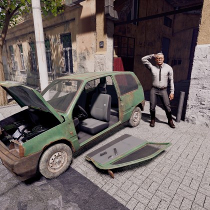 A distressed car dealer stands next to a broken-down vehicle in a city street.