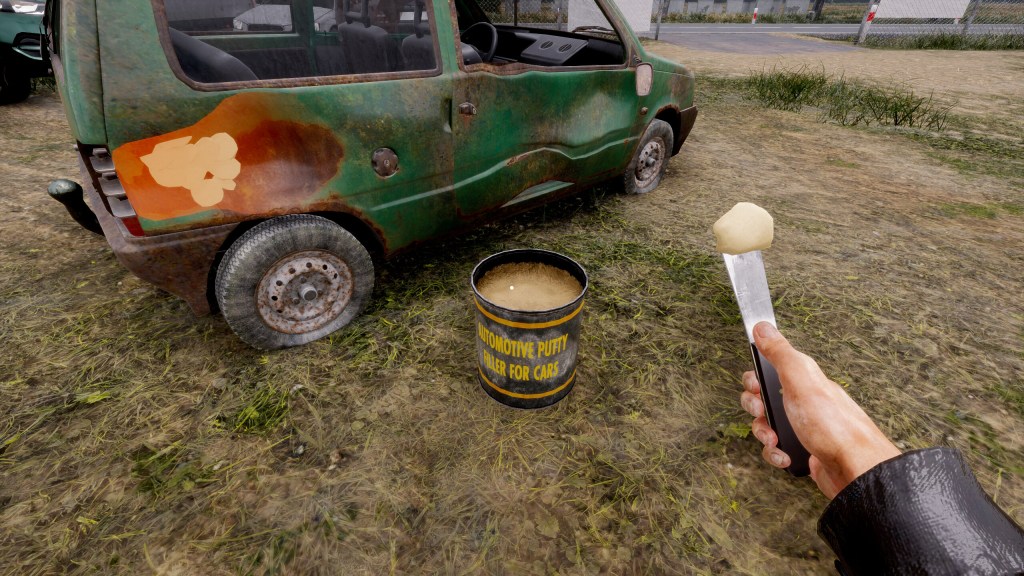 Player holding a tool near a rusty car in Totally Legit Wheeler Dealer