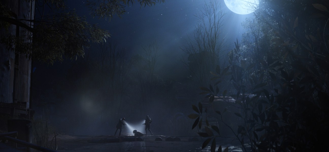 Two players exploring a dark landscape in ARC Raiders under a full moon.