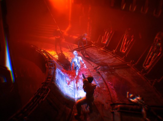 Intense survival horror scene from Graft with characters and vivid lighting