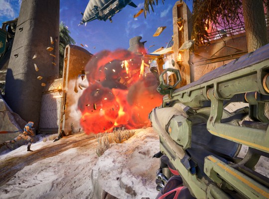 Intense action scene from Highguard featuring an explosion and character combat.