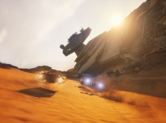Intense pod-racing action in a desert landscape from STAR WARS Galactic Racer.