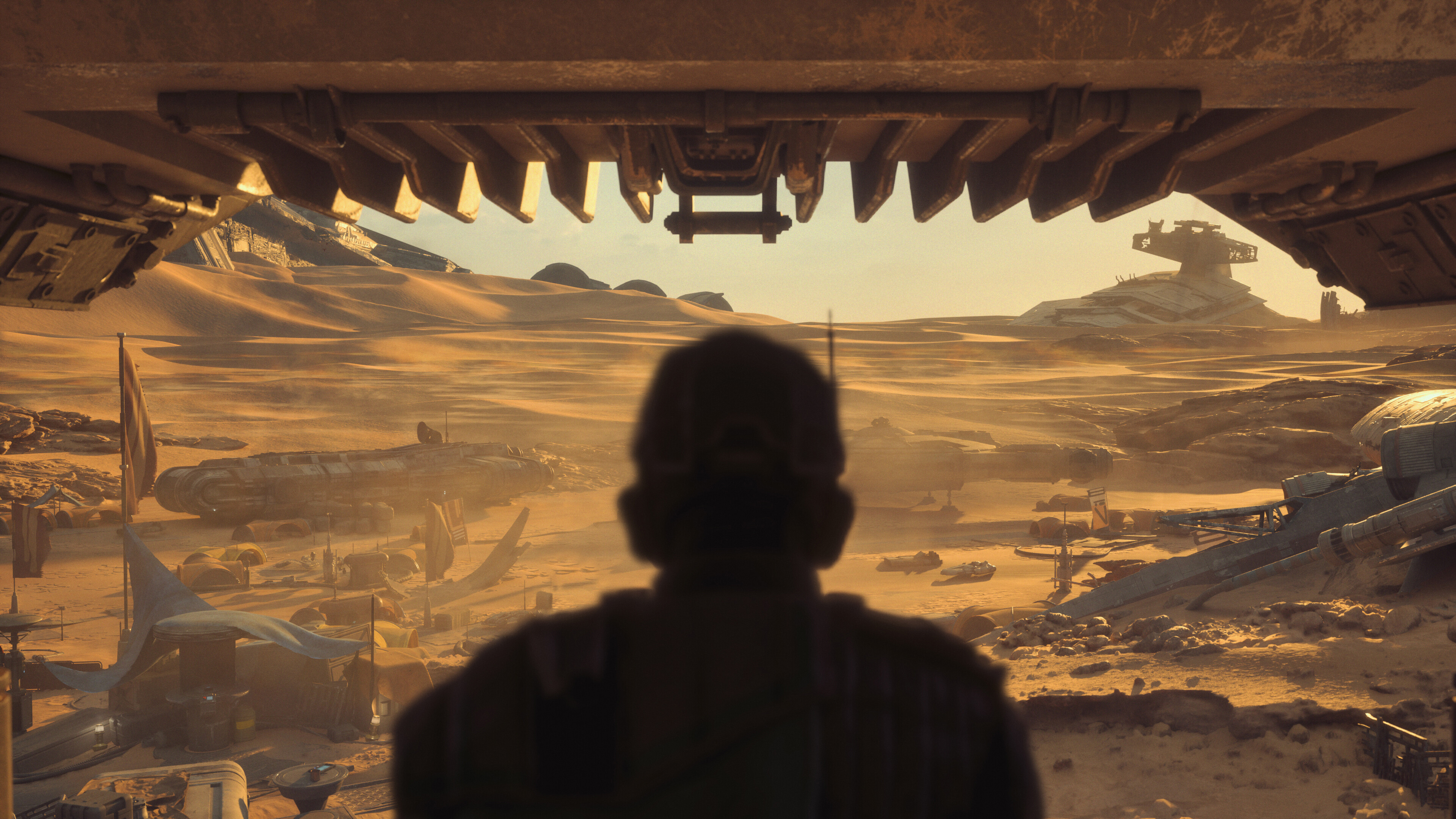 View of a desert landscape in STAR WARS Galactic Racer with a racer in the foreground