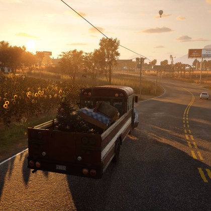 Sunset drive in Storage Hunter Simulator with truck and scenic landscape