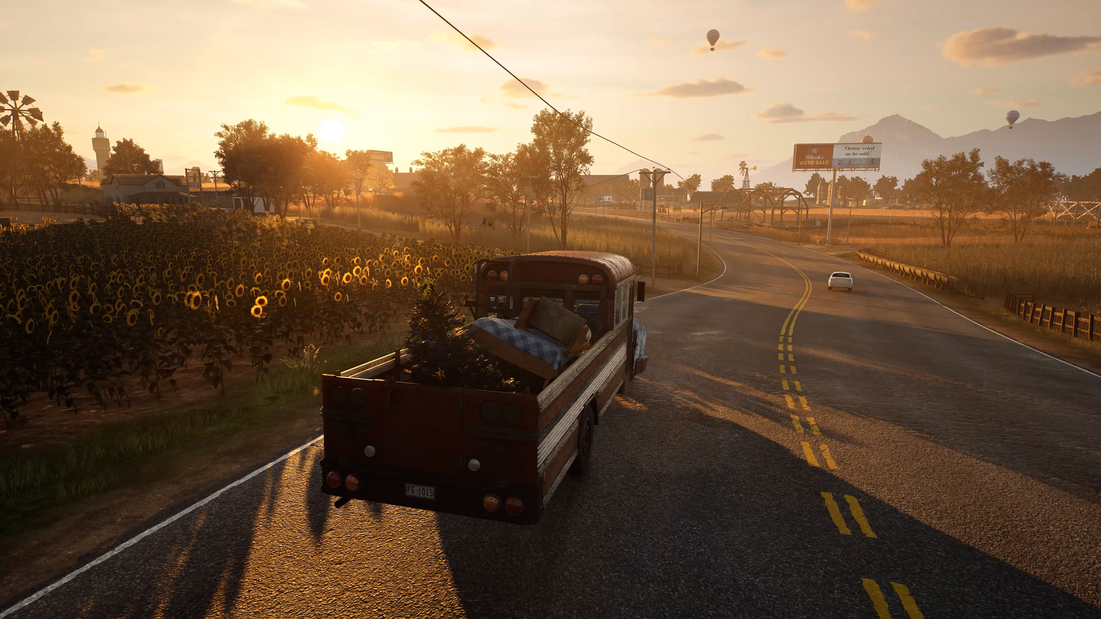 Sunset drive in Storage Hunter Simulator with truck and scenic landscape