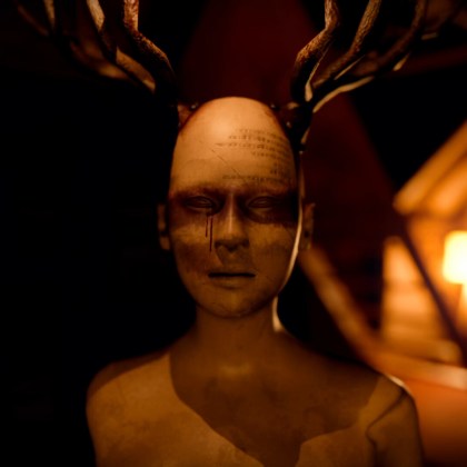 Eerie statue with antlers in dark attic setting from The 18th Attic game