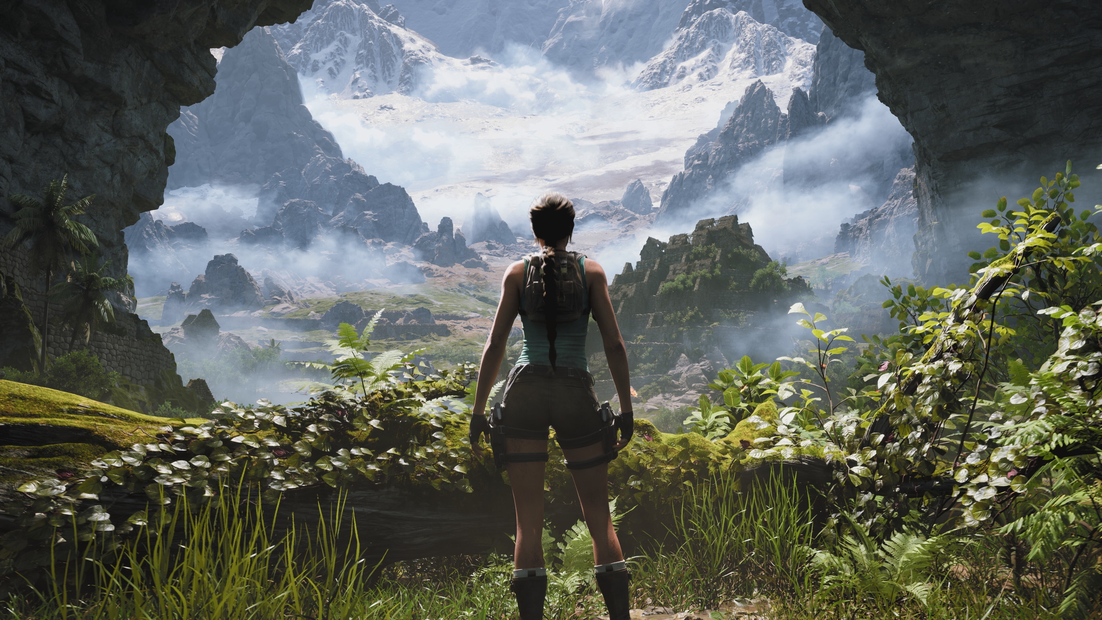 Lara Croft gazes over a lush valley in Tomb Raider: Legacy of Atlantis