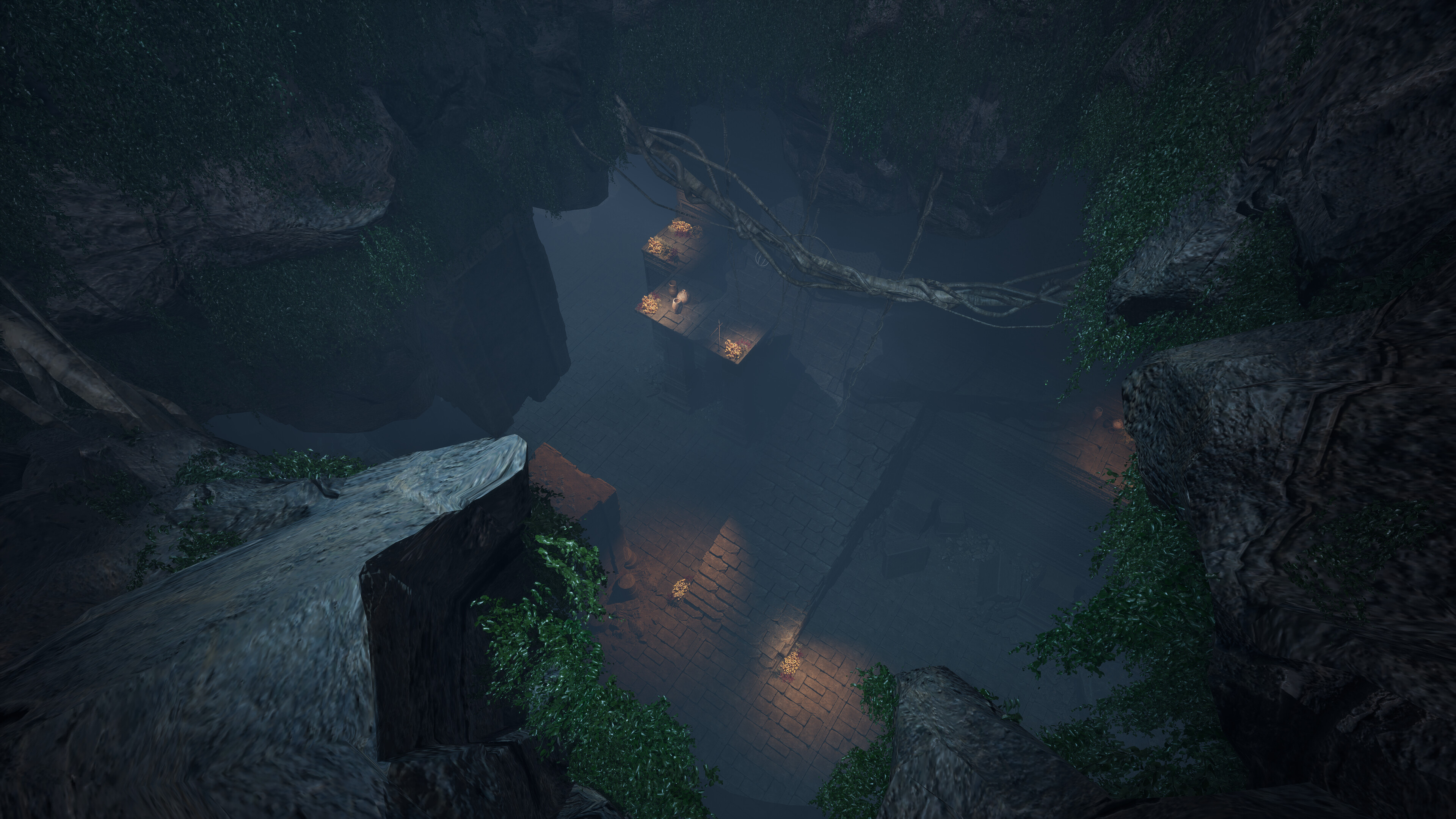 Aerial view of a mysterious cave in Dragon Khan, showcasing intricate lighting and lush foliage.