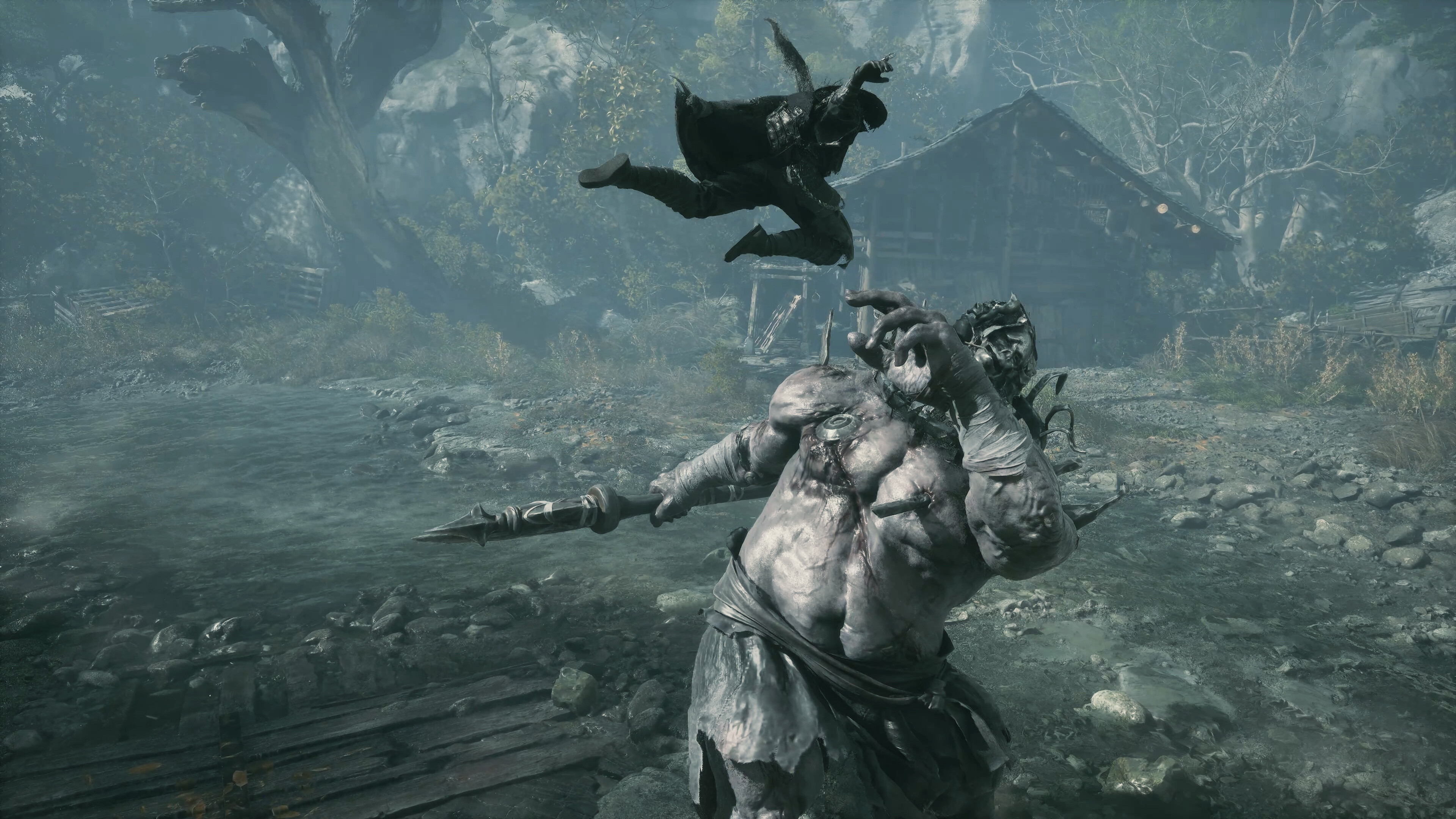 Intense combat scene in Phantom Blade Zero featuring an assassin and a giant enemy.