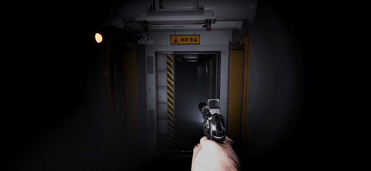 First-person view of a character holding a gun in a dark corridor aboard a ship.