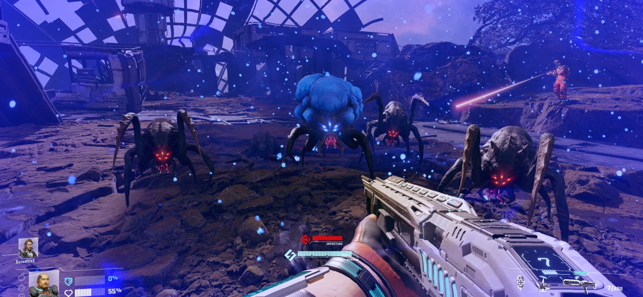 Intense sci-fi battle scene in StarRupture featuring alien creatures and futuristic weaponry.