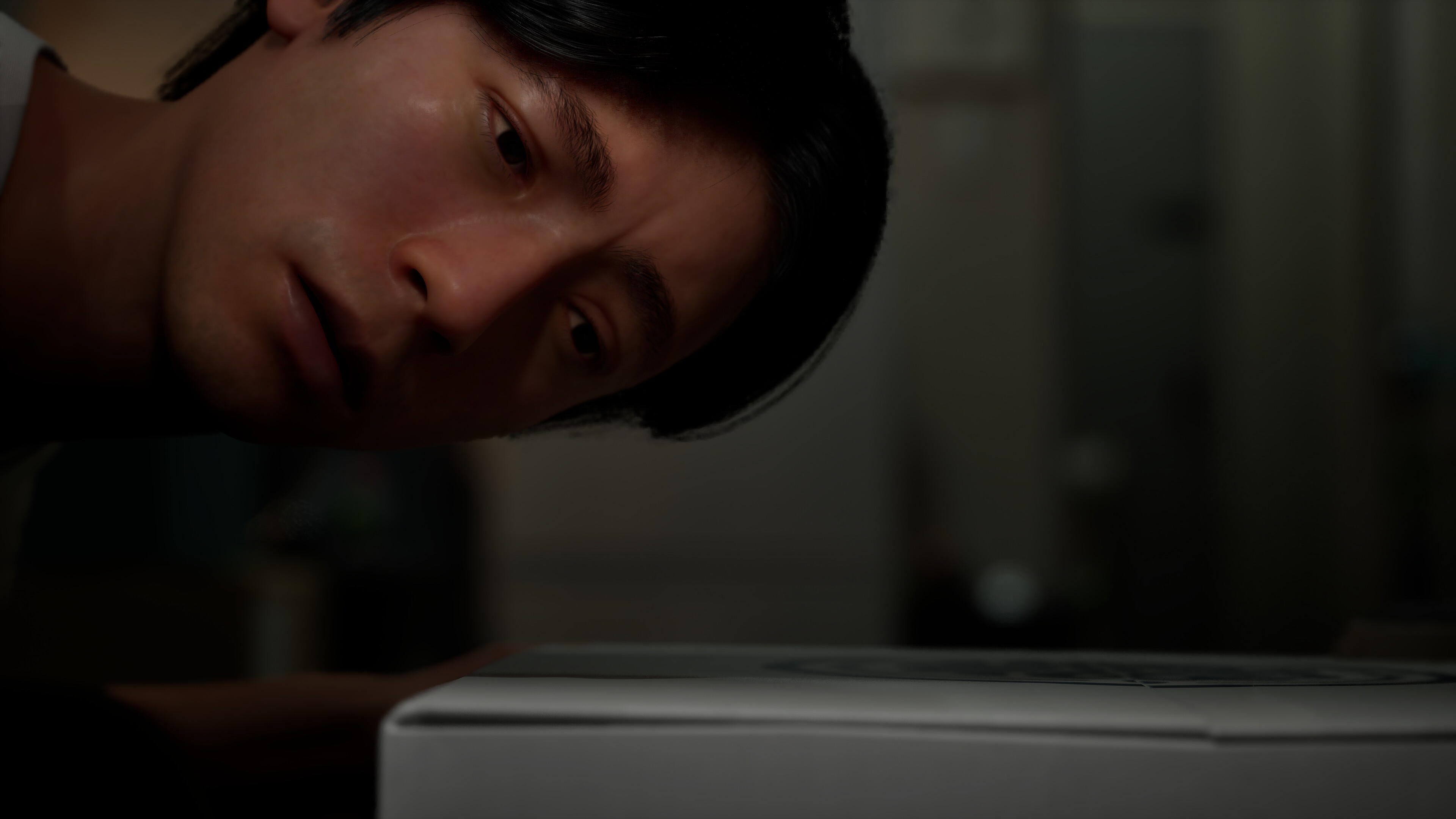 Hideo curiously examines a mysterious console in BrokenLore: Don't Play.