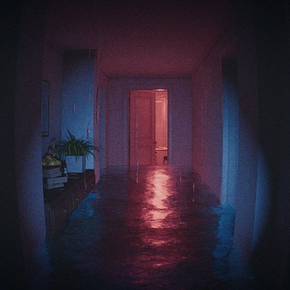 Eerie hallway in Captured 2 with surreal lighting and reflections