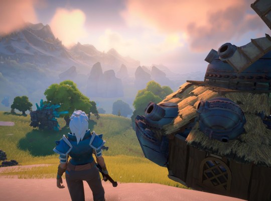 Character overlooking a vibrant landscape in Loya, an open-world survival RPG.