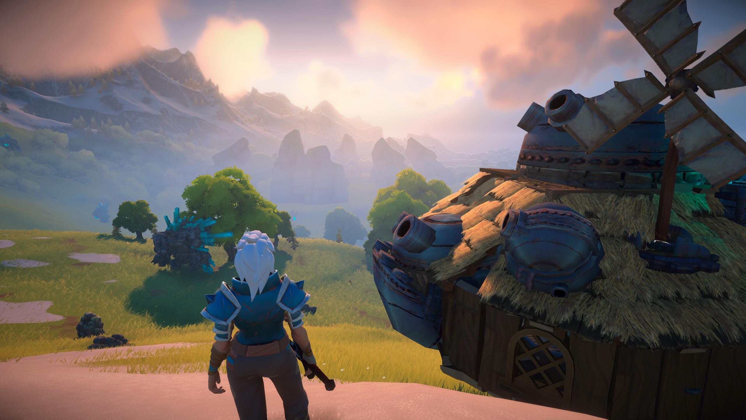 Character overlooking a vibrant landscape in Loya, an open-world survival RPG.