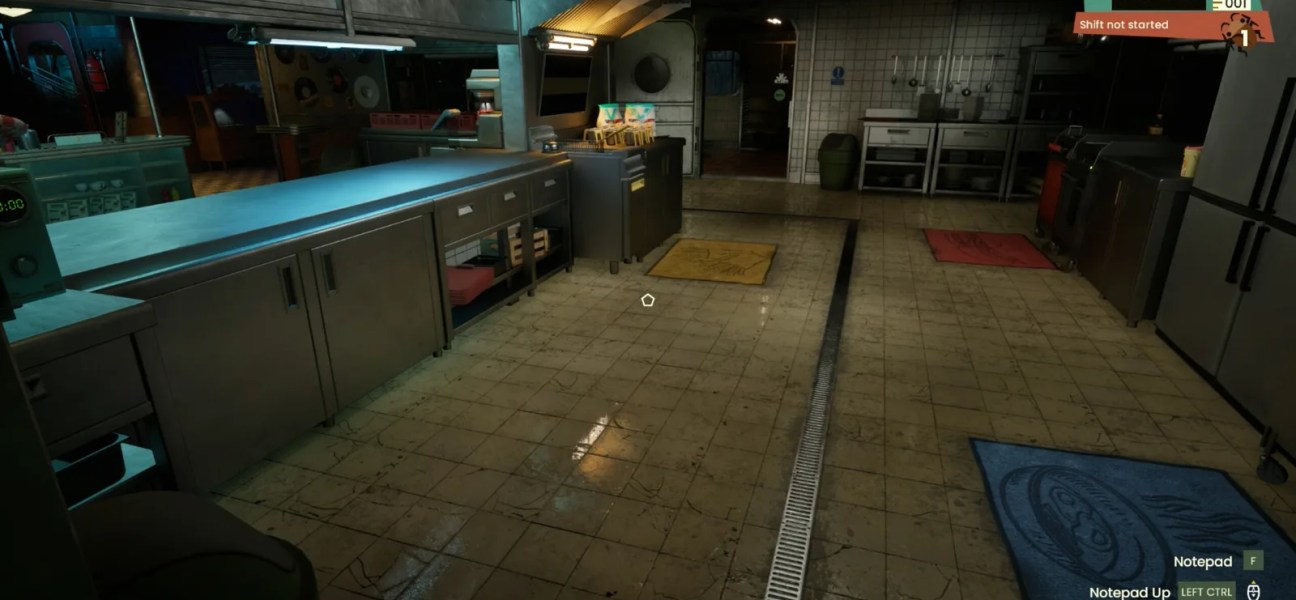 Interior of a diner kitchen in Road Diner Simulator: Prologue with cooking equipment and colorful mats.