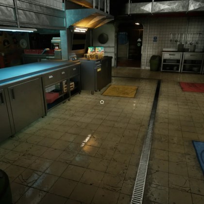 Interior of a diner kitchen in Road Diner Simulator: Prologue with cooking equipment and colorful mats.
