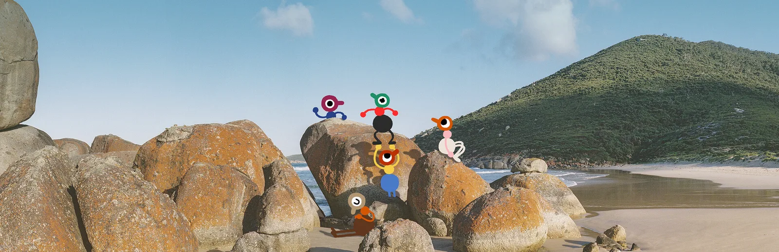 Colorful characters relaxing on rocks at the beach in Big Walk game