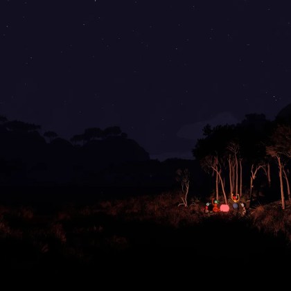 Nighttime scene in Big Walk with glowing lanterns and trees under starry sky