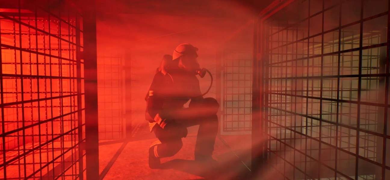 Firefighter in a smoky environment navigating through a dimly lit space